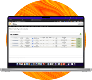 An open Macbook laptop showing some data from New Payments Innovation. There is an orange circle in the background.