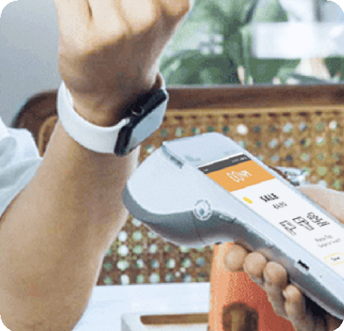 A person uses apple watch payment method to make a purchase