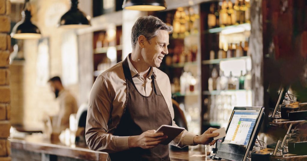 a bar owner uses an EPOS system for pubs in Ireland