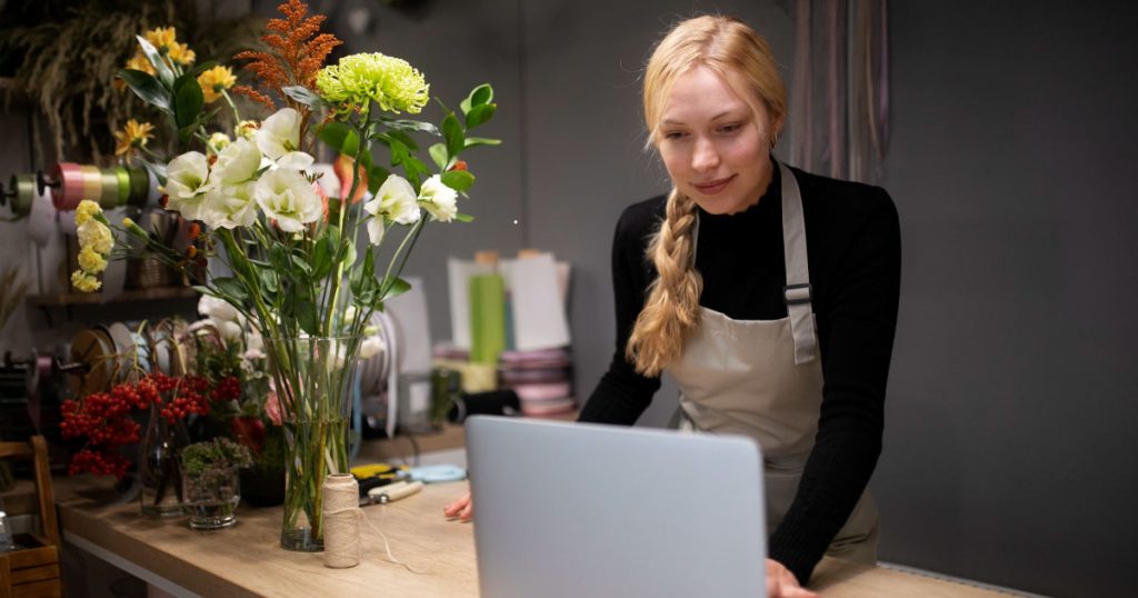 a female business owner using an online payment system