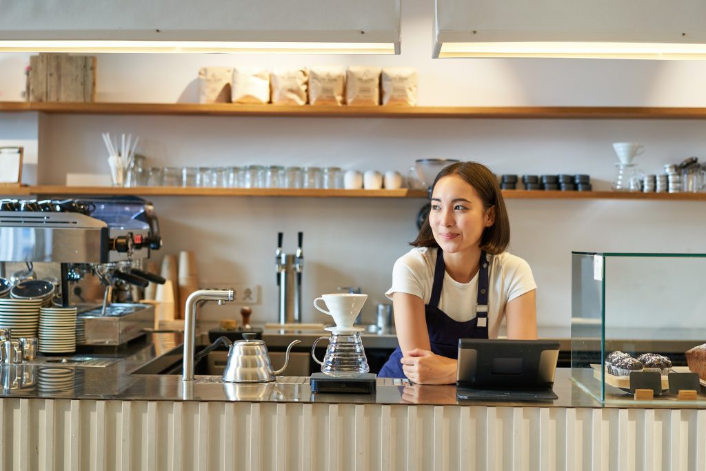 Card machine in use at Irish café with contactless payment being processed