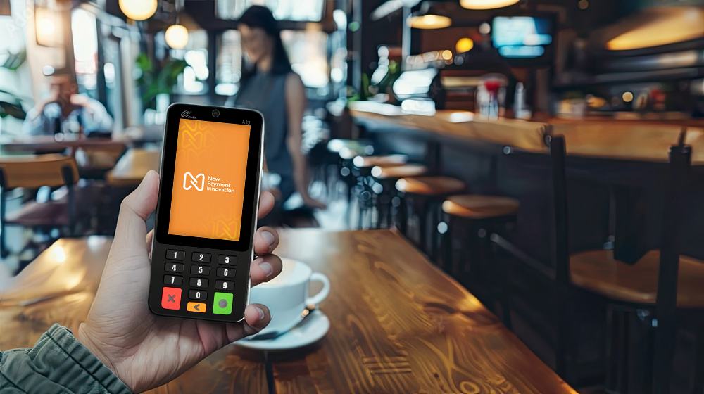 Hand holding PAX A35 card machine for recurring payments Ireland restaurant billing automation