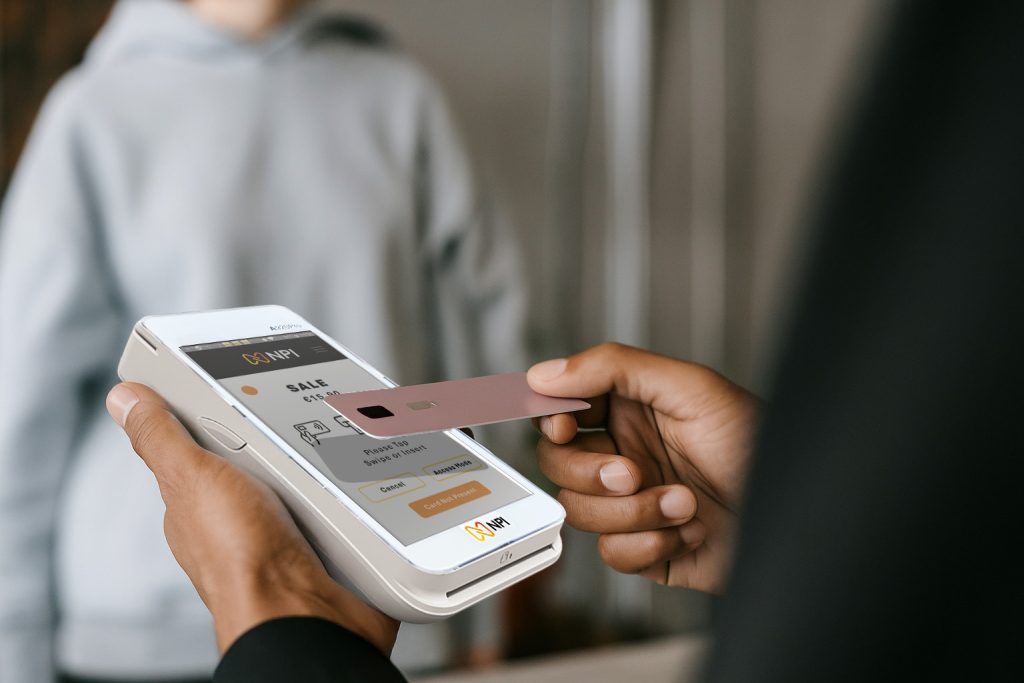 Customer making contactless payment on PAX A920 PRO terminal following payment authentication rules Ireland 2026
